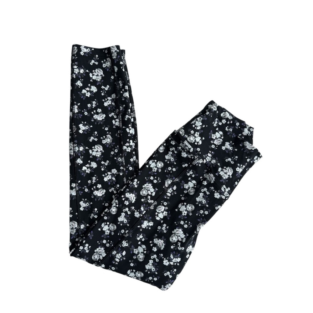 “Pink” Victoria Secret athletic floral leggings on black background (size S)